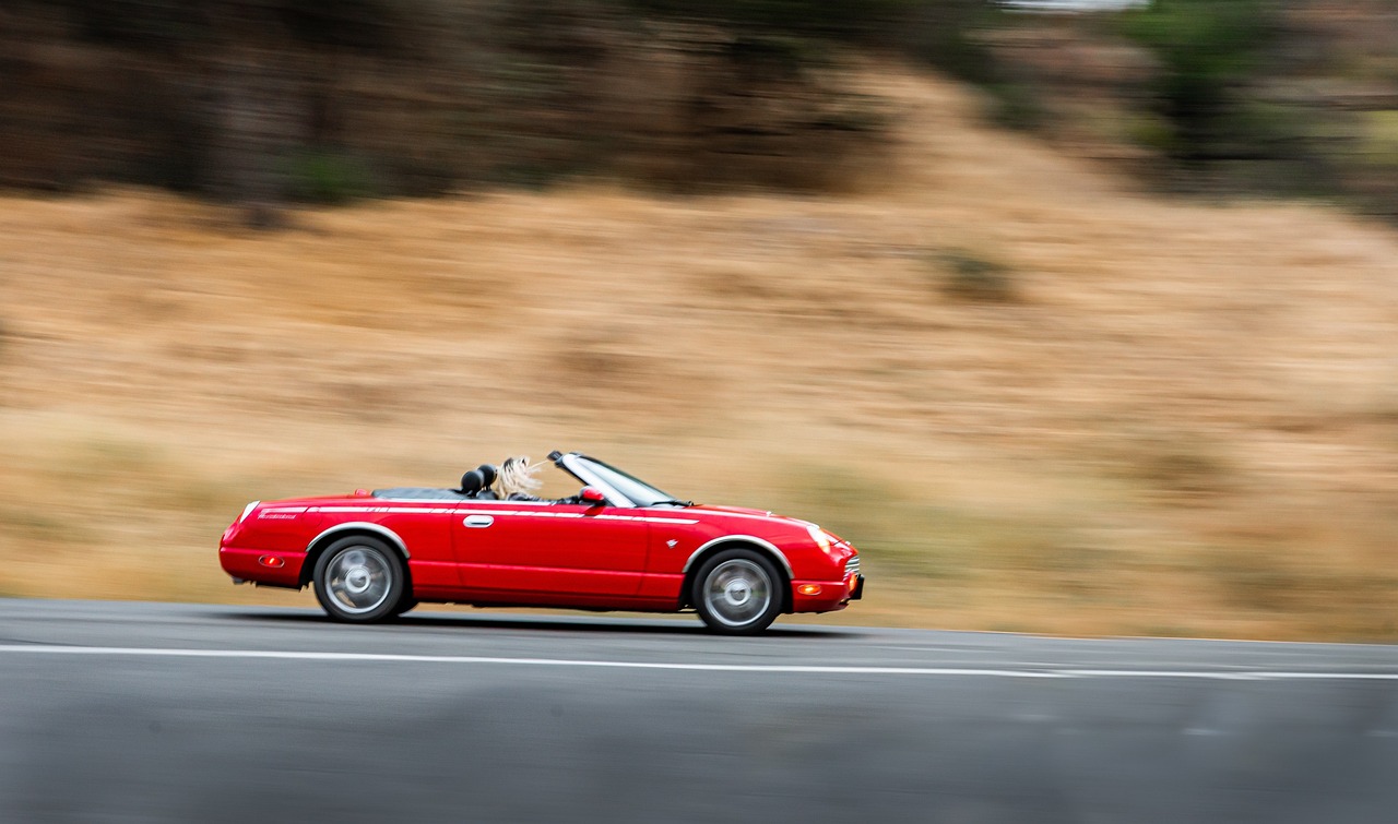 Car being driven in the countryside