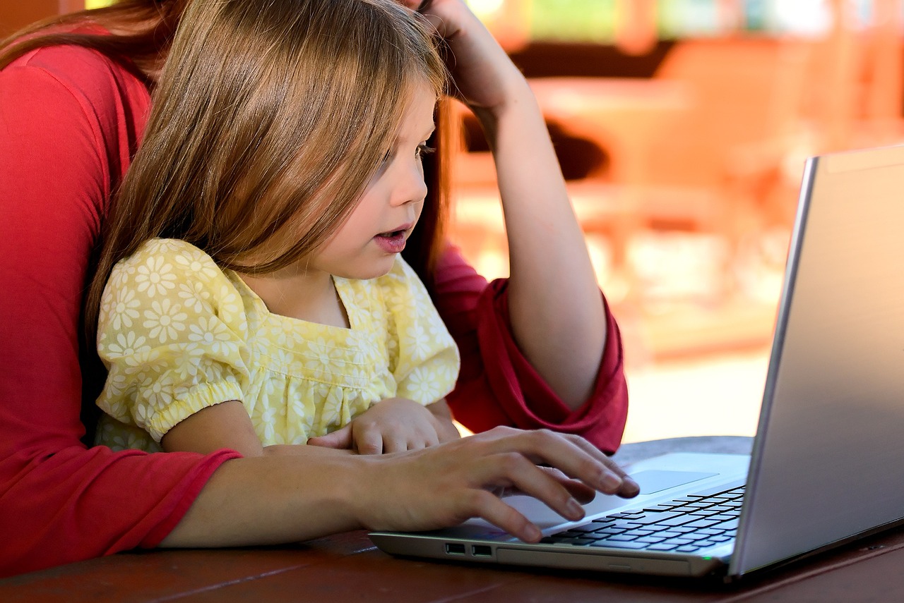 Parent and child at computer