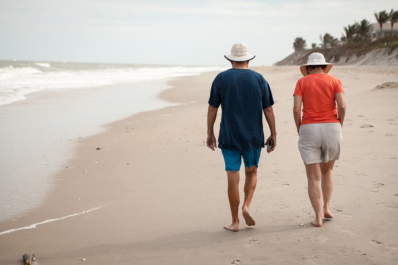 Couple walking along a beach