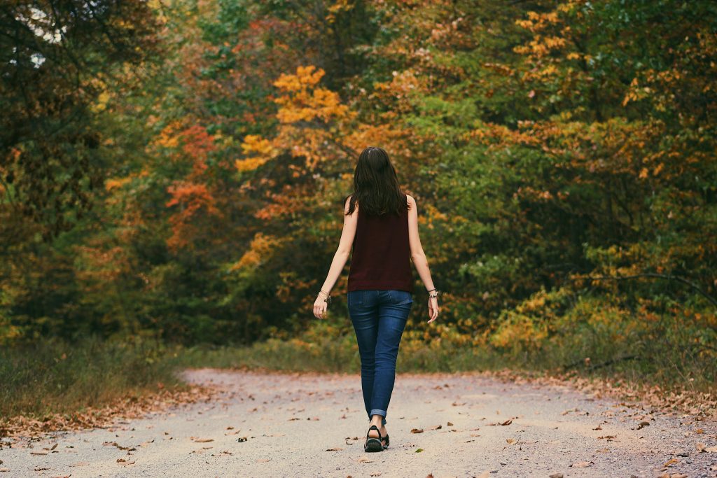 A person walking in a park.