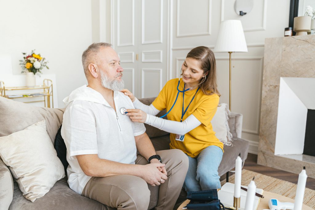 Carer caring for a patient.